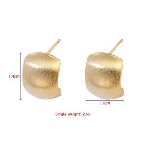 Detail showing dimensions of 1.4cm by 1.1cm and 2.1g weight for matte gold earrings