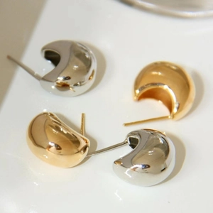 S925 silver pin crescent moon earrings in polished gold and silver metallic finishes