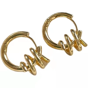 Polished gold geometric spiral hoop earrings with triple interlocking rings for women