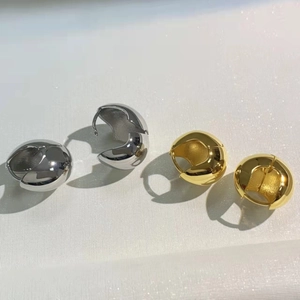 Minimalist chunky geometric hoop earrings in polished gold and silver metal finishes