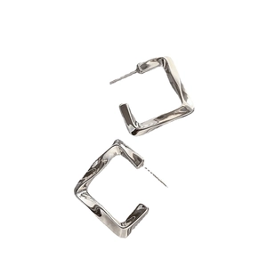 Polished silver geometric square twisted earrings for women in a minimalist luxury style