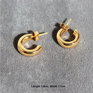 Detailed view of polished gold C-shape hoop earrings showing 1.8cm x 1.7cm dimensions