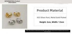 Macro view of multi-layer twisted C-shape earrings in gold and silver finish