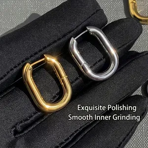 Polished 14K gold and silver U-shaped geometric metal hoop earrings for women