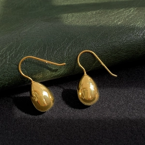 French style 14K gold plated brass teardrop earrings with a polished mirror finish surface