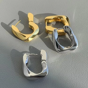 Chic geometric metal U-shaped buckle earrings in polished gold and silver finish