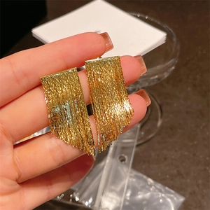 Chic golden tassel drop earrings featuring long dangling metal chains for women