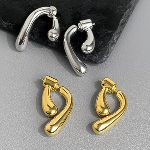 Modern 18k gold and silver plated crossover teardrop earrings with a high-polished finish