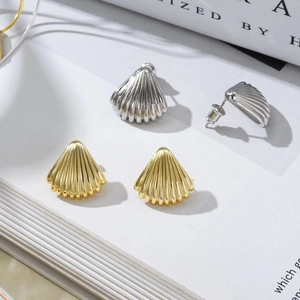 Chic 18K gold and silver plated shell stud earrings with ribbed texture on open book