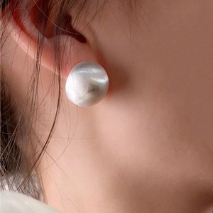 Elegant silver brushed dome earrings for women featuring a minimalist matte metallic finish