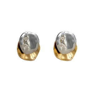 Boucles d'oreilles ondulées bicolores or et argent au design organique et texturé