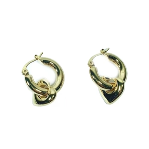 Gold plated heart hoop earrings featuring detachable charms for a versatile 2-in-1 style