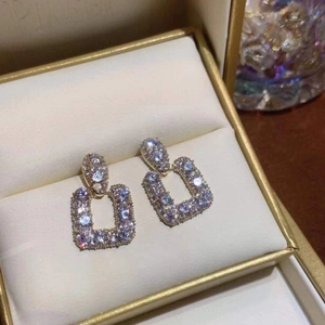 Square 925 silver stud earrings with micro-inlaid cubic zirconia in a jewelry box