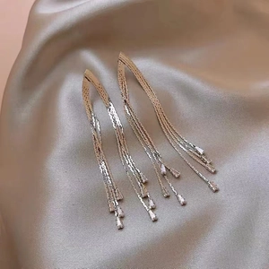 Luxurious long tassel drop earrings with metallic chains and sparkling zircon stones