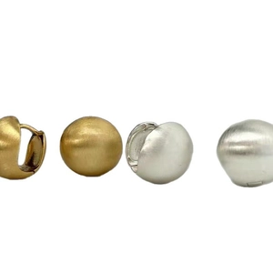 Minimalist matte brushed metal dome huggie earrings in gold and silver finishes