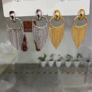 Elegant gold and silver long tassel fringe earrings featuring a spherical stud design