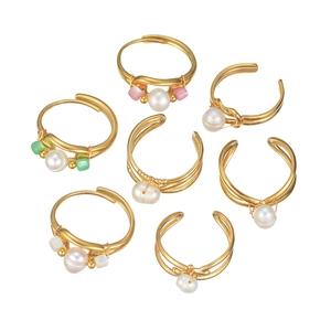 Set of 7 gold-plated open rings with freshwater pearls and colorful gemstone accents