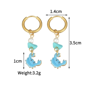 Detail view of gold hoop earrings with crab pendant and turquoise stones showing 3.5cm size