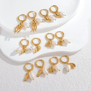 Ocean series pearl earring set with whale and seahorse pendants in gold finish