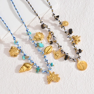 Bohemian woven ocean charm necklace with 18K gold plated fish and shell pendants