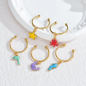 Detailed view of colorful ocean animal charms in gold plating with enamel drip finish