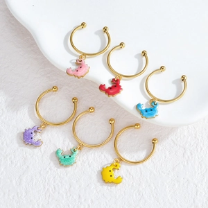 Set of 6 gold stainless steel rings featuring colorful enamel crab charms in various shades