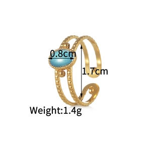 Detail view of gold stainless steel ring with blue cat eye stone and 1.7cm inner diameter