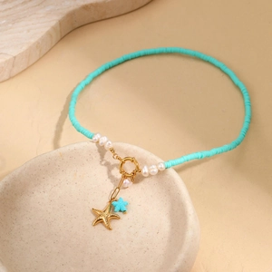 Handmade ocean style clay beaded necklace with blue sea star pendant and white pearls