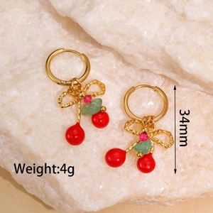 Detail of gold cherry earrings with red beads, green stones, and dimensions 34mm 4g