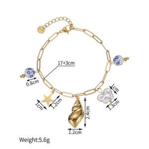 Blue and white ceramic beads bracelet with golden sea shell and star charms on link chain