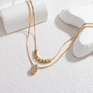 Elegant gold-plated double-layer necklace with geometric beads and rhinestone drop pendant