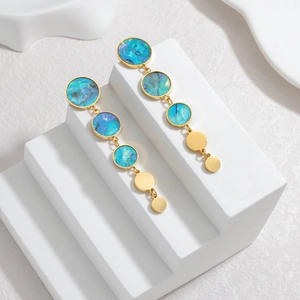Elegant gold drop earrings with five geometric circles featuring turquoise marble inlays