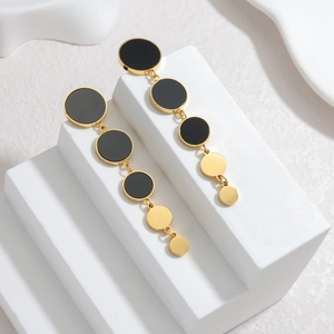 Modern 18K gold-plated long tassel earrings with black enamel circular drop design