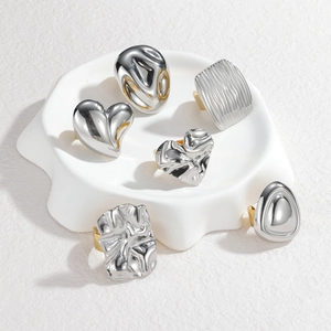 Set of 6 minimalist silver stainless steel rings with geometric heart and ruffled textures