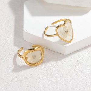 Adjustable gold stainless steel rings with real white dried flowers in clear resin