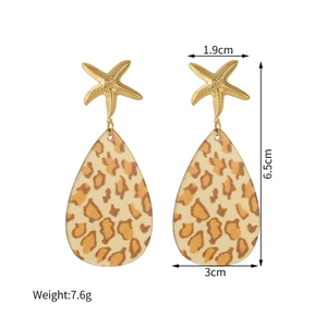 Boucles d'oreilles léopard en forme de goutte avec étoile de mer dorée et dimensions
