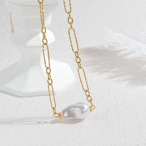 Baroque pearl pendant necklace on textured 18k gold plated chain in French vintage style