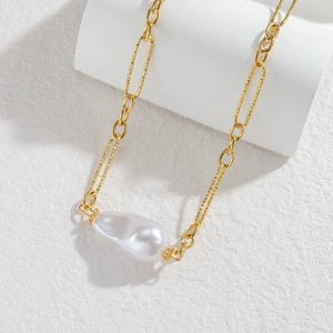 Baroque pearl necklace with 18k gold plated stainless steel chain on white background