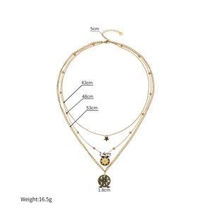 Three-layer gold stainless steel necklace with star and moon phase charms detail