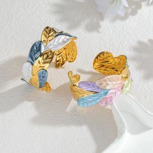 Adjustable leaf-shaped stainless steel cuffs with colorful floral enamel and gold plating