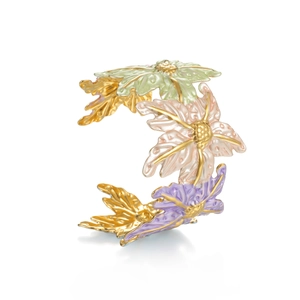 Artistic gold-plated wide cuff bracelet featuring colorful enamel floral and leaf motifs