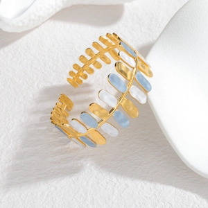 Adjustable leaf pattern gold cuff bracelet with blue and white enamel inlay