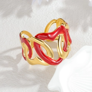 Vintage stainless steel open bangle with red enamel hearts and coral cutouts