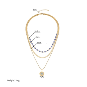 Collier doré à trois rangs œil protecteur avec dimensions 39,5-51cm et pendentif soleil