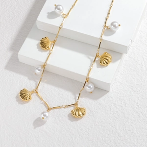 Elegant gold-tone stainless steel shell pendant necklace with white pearls for women