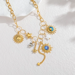 Bohemian gold plated sun and star pendant necklace with celestial charms and crystals