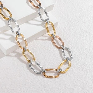 Three-tone oval chunky chain necklace with hammered texture in gold, silver, and rose gold