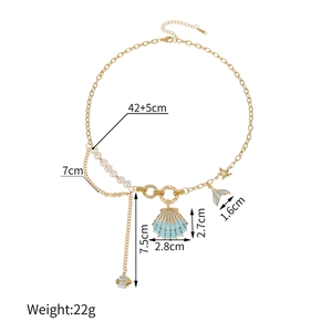 Beaded pearl necklace with blue shell and fish pendants in gold-tone stainless steel