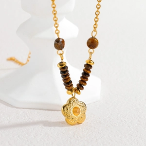 Vintage 18k gold plated titanium steel necklace with floral pendant and tiger eye beads