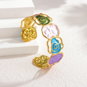 Artistic gold-plated open bangle with colorful enamel floral patterns and hammered texture